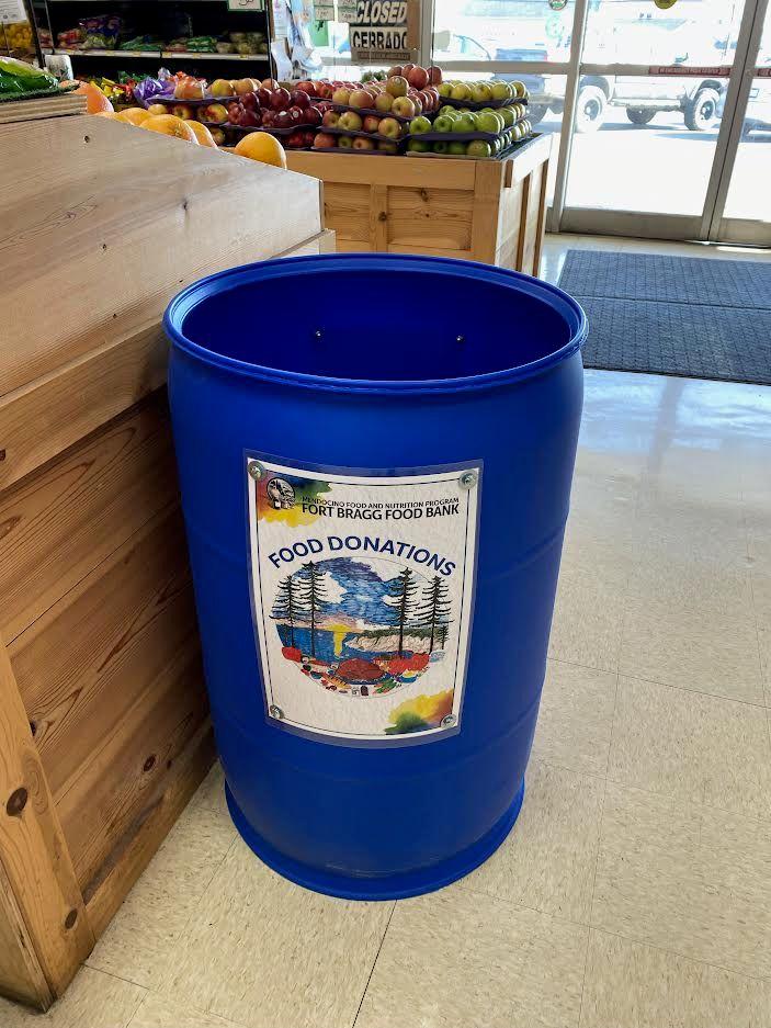 Donation Bin with art work by Staff Kristin Hock located at Purity Market